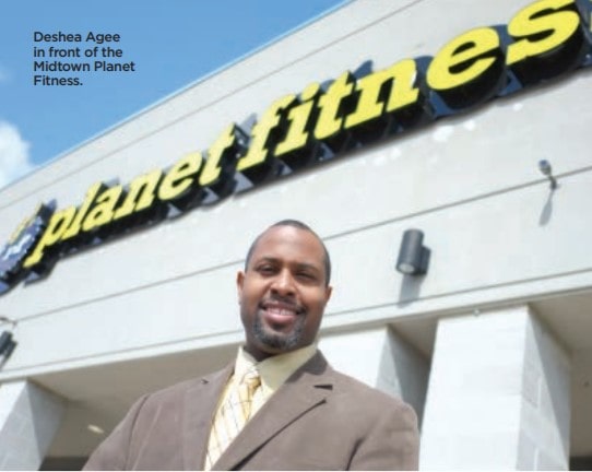milmag-acre-program-story-Deshe-Agee-front-of-the-Midtown-Planet-Fitness.